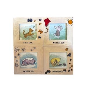 Disney Winnie the Poo and friends framed artwork.